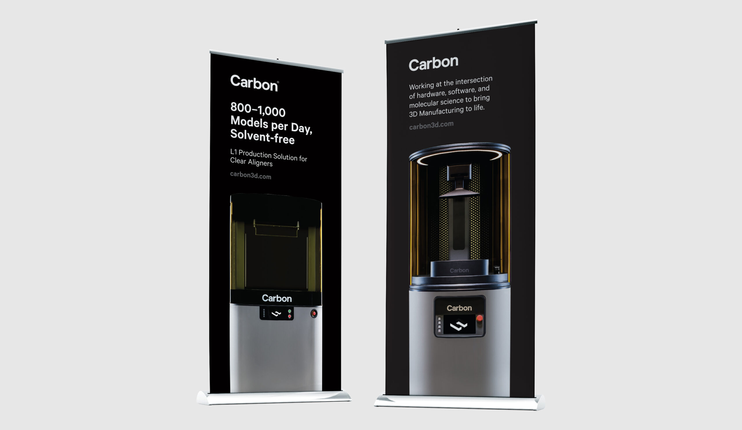 Prior to COVID, Carbon had booths at a variety of trade shows. These are two of the many roll up banner designs that were displayed featuring their L1 printer (left) and M2 printer (right).